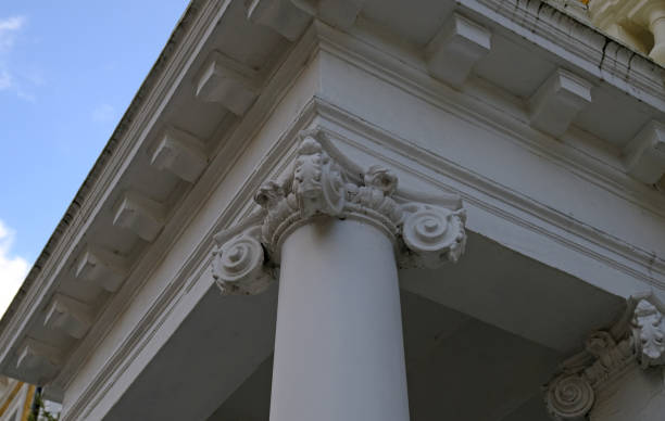 istock Classic architectural column. Details of architecture of historical construction. Element of exterior building with columns and Stucco molding on ceiling of architectural structure in London, UK. 1457684328