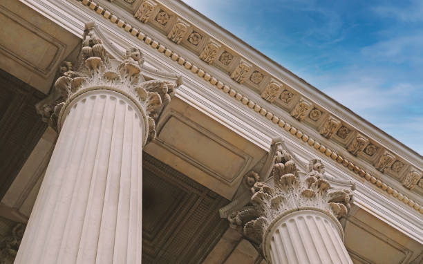 istock Classic architectural column. Details of architecture of historical construction. Element of exterior building with columns and Stucco molding on ceiling of architectural structure in London, UK. 1457684454