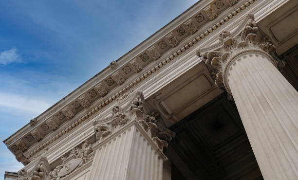 istock Classic architectural column. Details of architecture of historical construction. Element of exterior building with columns and Stucco molding on ceiling of architectural structure in London, UK. 1457684667