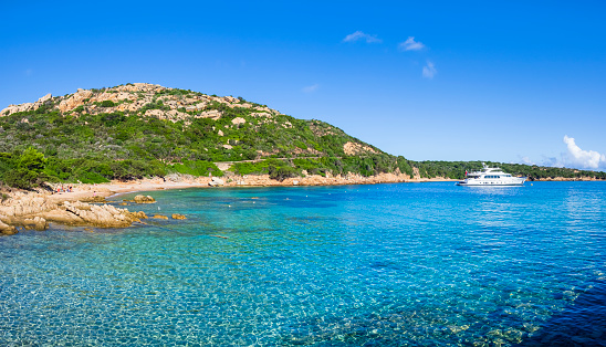 Clear waters and granite rocks at the Spalmatore Bay, one of the naturalistic treasures of La Maddalena Island (4 shots stitched)