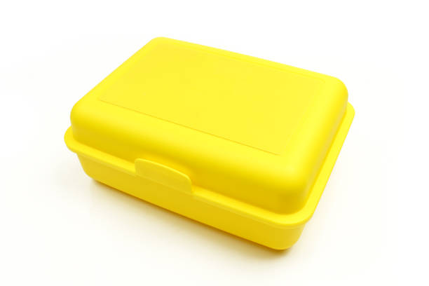 istock Yellow closed plastic lunch box case isolated on white background 1457691630