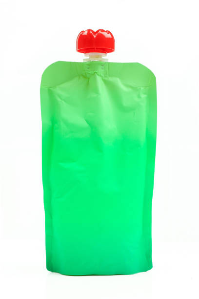 istock Blank green puree bag. Liquid container packaging isolated on white background 1457693620