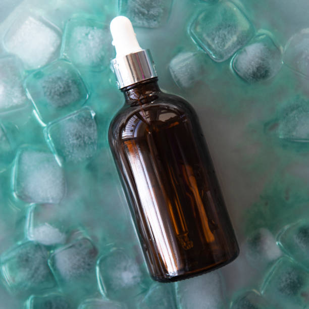 istock Cosmetic product packaging on menthol ice cubes. Mockup. 1457698320
