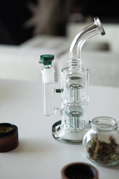 istock Clear glass bong. Smoking marijuana at home. 1457699468