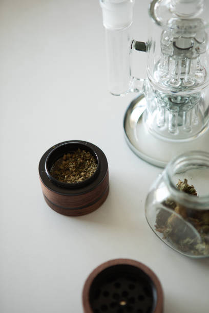 istock Clear glass bong. Smoking marijuana at home. 1457699496