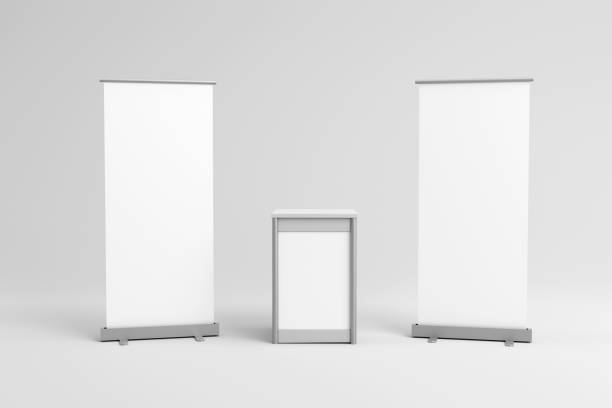 istock Pullup banners with a shaped exhibition point of sale table, 3d render 1457704400
