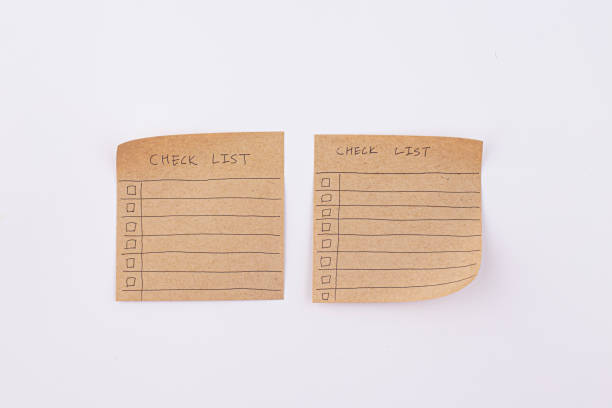 istock hand draw checklist on note taped recycle paper 1457705319