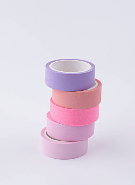 colorful masking tape rolls background on white