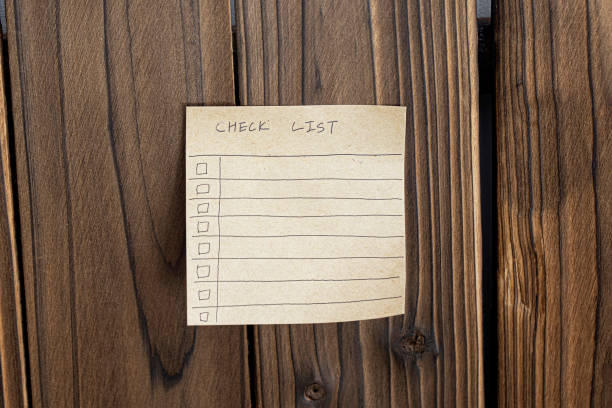 istock hand draw checklist on note taped recycle paper 1457705713