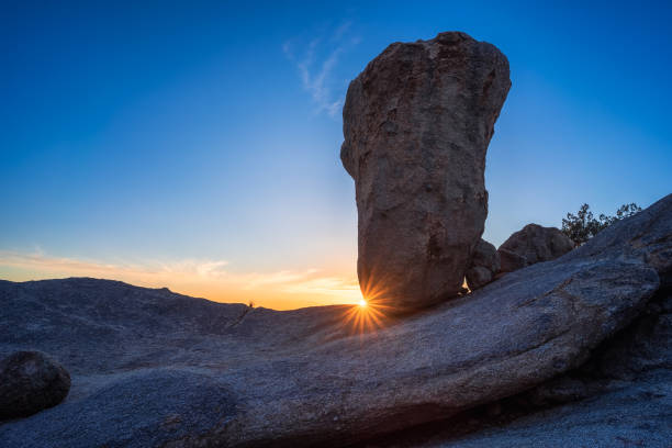 istock Sunset beams through Balanced Rock in The McDowell Sonoran Preserve 1457706916