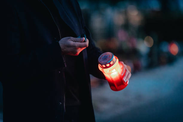 istock Man in the cemetery 1457711804