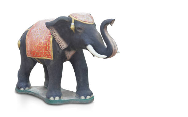 istock antique black elephant standing on green ground, on white background, object, animal, statue, copy space 1457713281