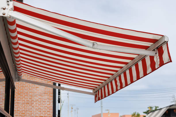 istock white and red strip awning. out door canvas roof. 1457715594