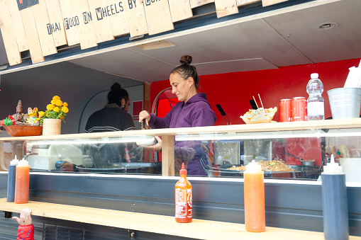 Chef serving thai food on the street