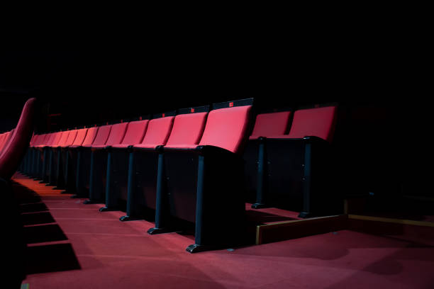 istock vacant theater with red seats 1457722271