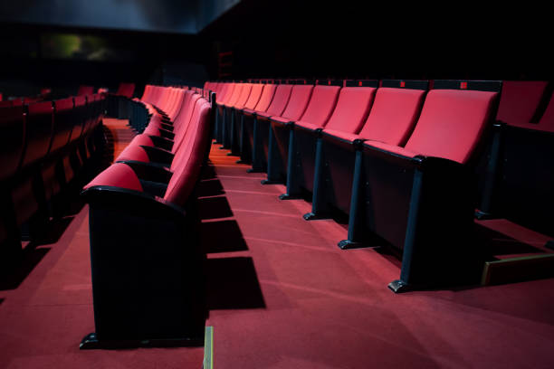 istock vacant theater with red seats 1457722294