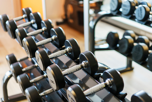 Gym and workout equipments in fitness center