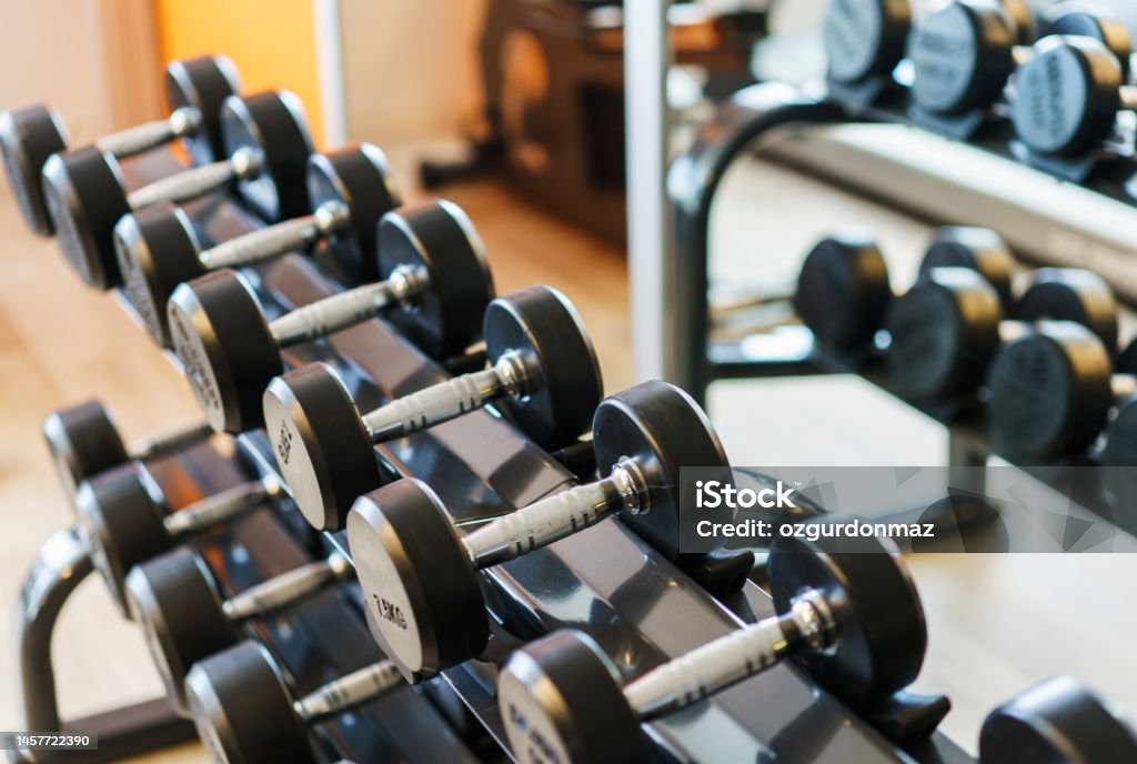 Gym and workout equipments in fitness center Gym Stock Photo