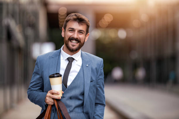 istock Successful and happy businessman, looking at camera 1457723360