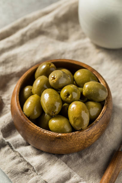istock Raw Green Organic Marinated Olives 1457725995