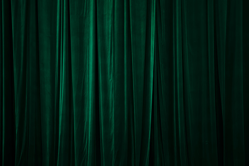 green curtain in theatre. Textured background
