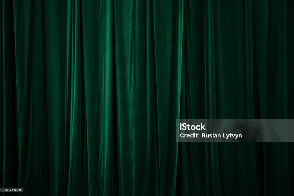 green curtain in theatre. Textured green curtain in theatre. Textured background Curtain Stock Photo