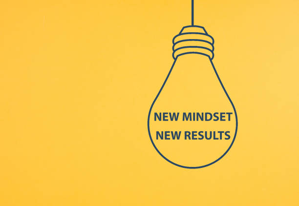 New mindset new result is standing inside the light bulb, business and education concept