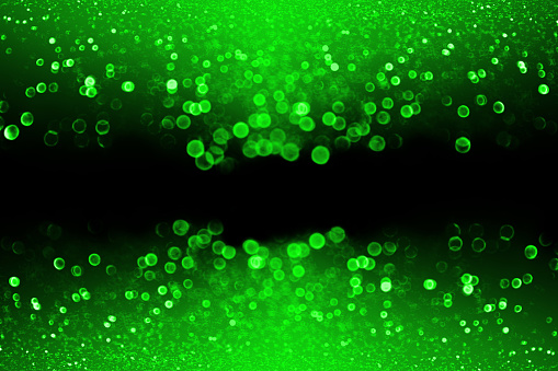 Abstract emerald green glitter sparkle background, happy birthday party invitation, St Patrick’s Day luck sale flyer, lucky Saint Patty Irish Paddy children leprechaun banner or kid confetti invite
