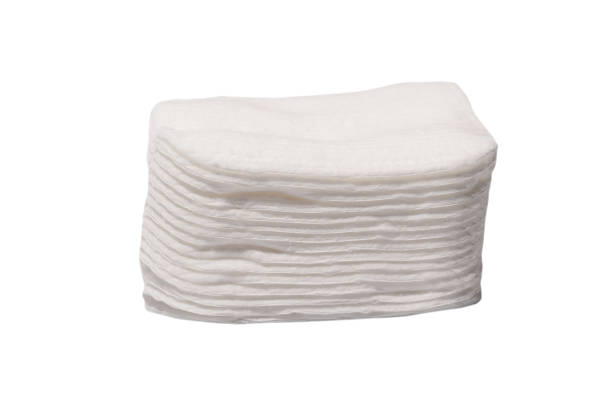istock Stack of white cotton sponges isolated on a white background. 1457728629