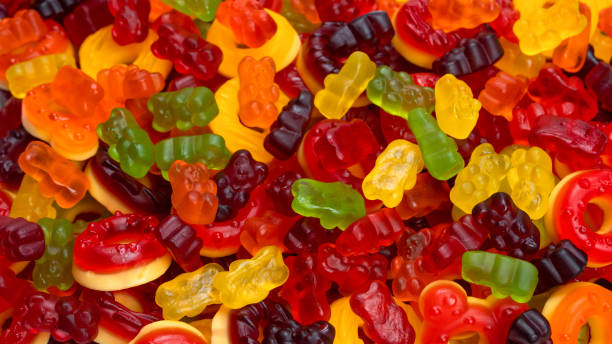 istock Assorted colorful gummy candies. Jelly donuts. Jelly bears. 1457728726