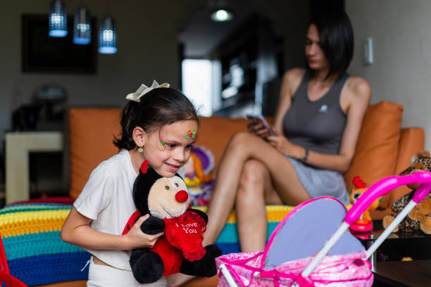 istock Little girl playing at home 1457728972