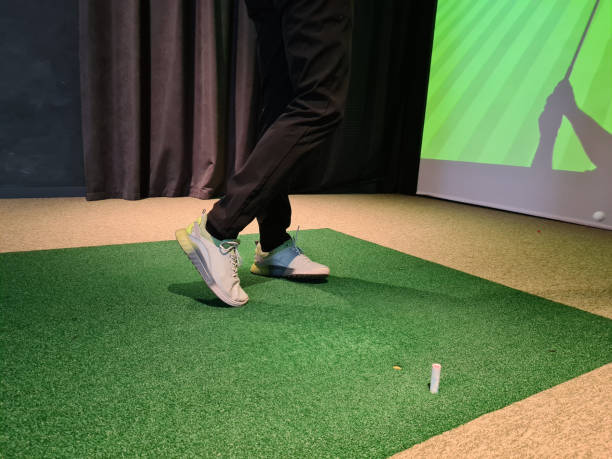 istock Legs of man playing golf on screen 1457729533