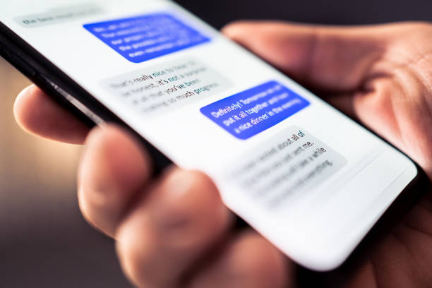 istock Text message in phone. Send sms with smartphone. Mobile conversation and texting in instant messaging and online chat app in cellphone. Communication in business network. 1457729965