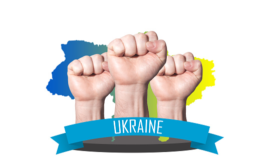 Fists raised up banner about the unity of the Ukrainian people, solidarity of people