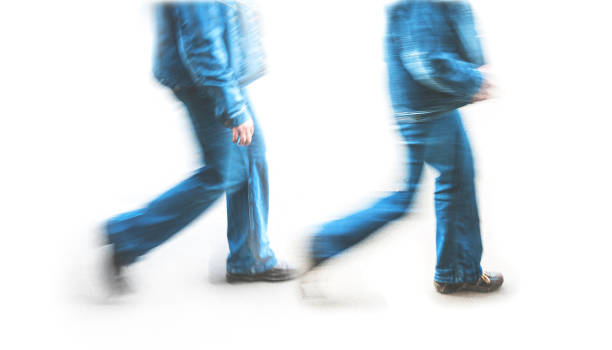 istock men dressed denim jeans suits at blurry motion, long exposure 1457735352