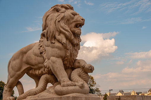 Old Stone Lion in front of Bournemouth Town Hall, in public central gardens