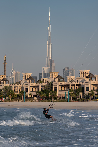 January 12th 2023, Dubai UAE, A view of Kite surfers practicing kitesurfing with the backdrop of the iconic Burj Khalifa in the background