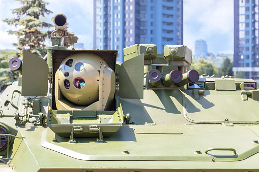 Military equipment and technologies, laser-optical sighting station for installation on military ground vehicles such as armored personnel carriers, infantry fighting vehicles or tanks.
