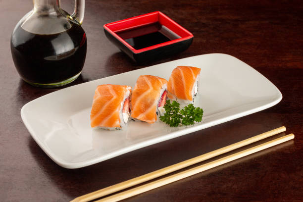 istock Sushi sashimi on the plate with soy sauce on the table. 1457739369