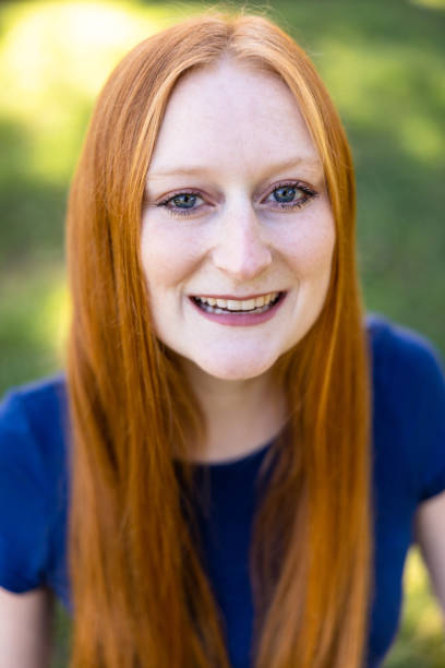 istock Young Red-haired girl outdoors 1457741104