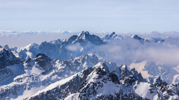 istock Snowy winter high mountain landscape. 1457744438