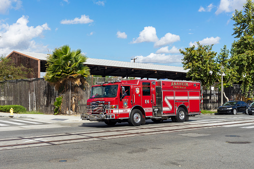 Anaheim, CA, USA – November 2, 2022: Anaheim Fire and Rescue truck on a street the Orange County city of Anaheim, California.