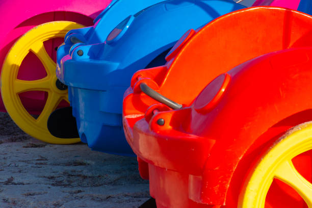 istock Colorful pedal boats on the sand 1457748321