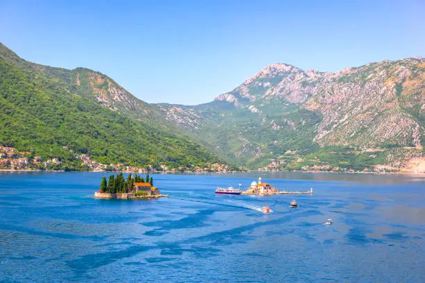 Famous islands in Adriatic sea among mountains of Montenegro