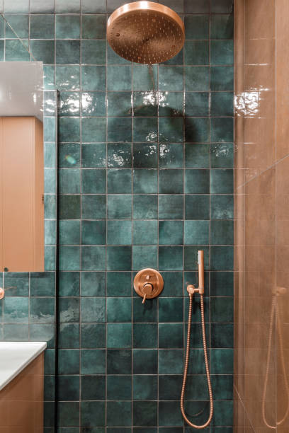 istock Minimalistic bathroom interior design in green and terracotta shades. 1457751397
