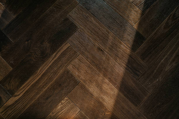 Varnished parquet floor in an empty apartment.