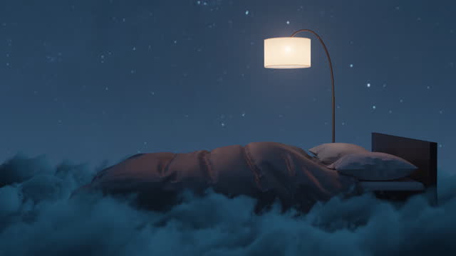 Cozy bed illuminated by lamp. The bed flying over fluffy clouds at night