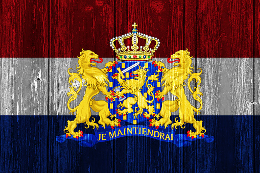 Netherlands flag on a textured background. Concept collage.
