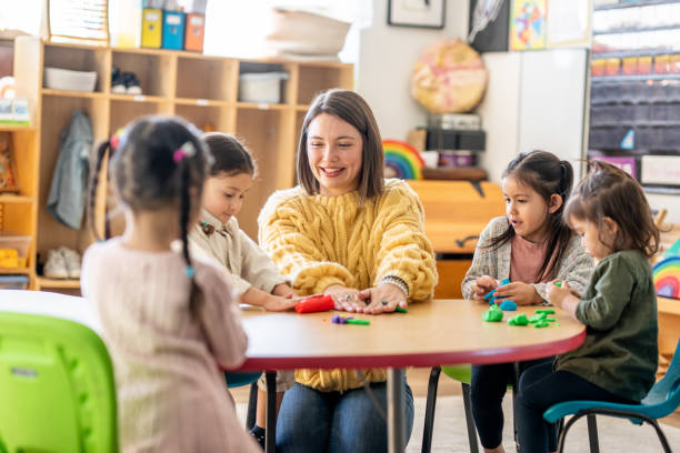 istock Kindergarten Students with Their Teacher 1457758214