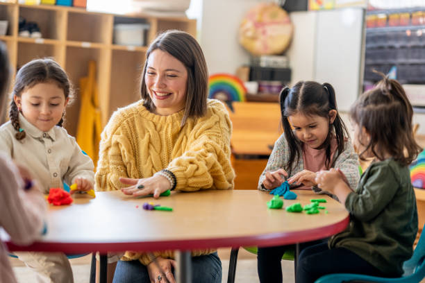 istock Kindergarten Students with Their Teacher 1457758220